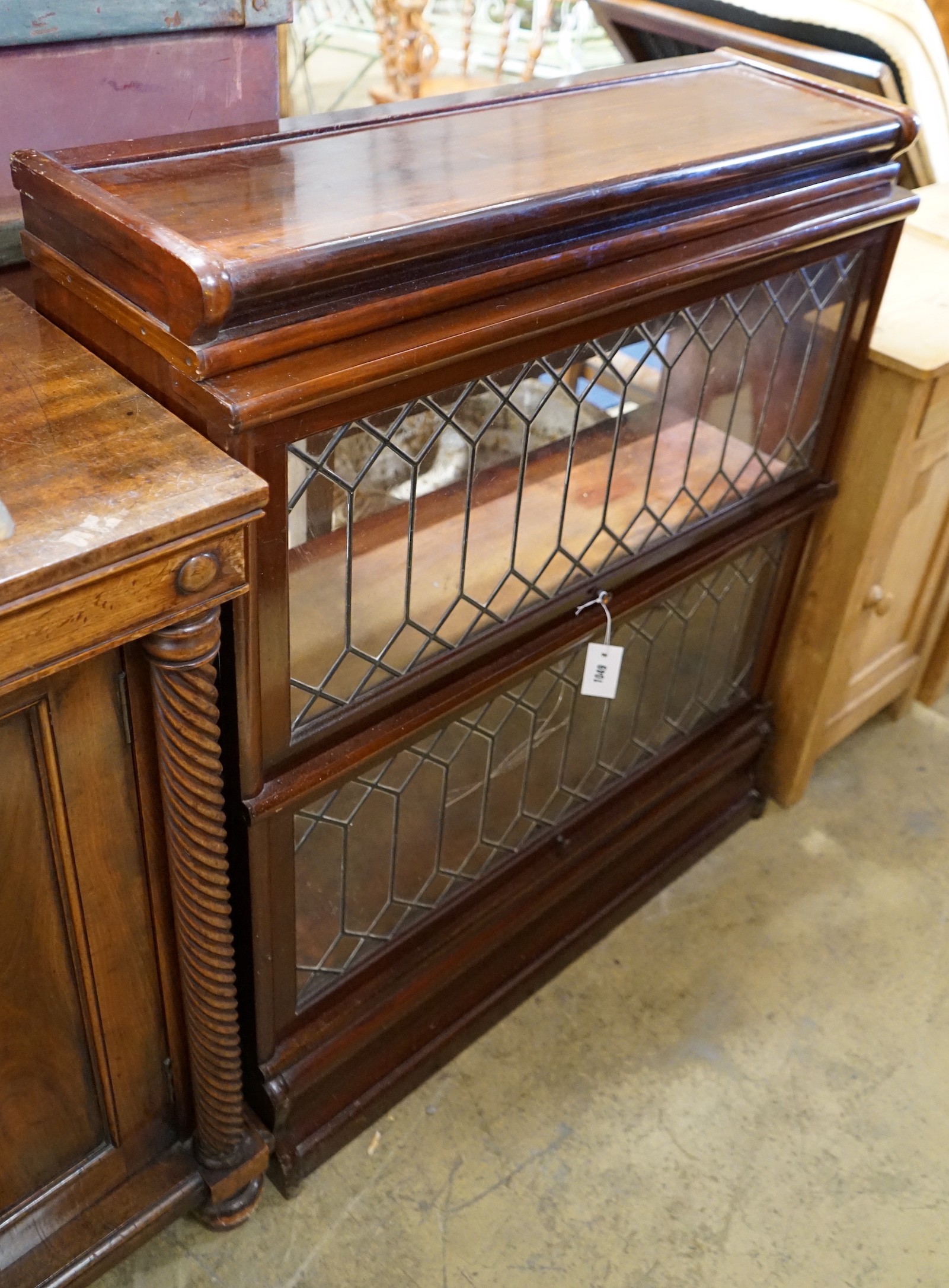 A Globe Wernicke type mahogany two section bookcase (lacks back panels), width 87cm, depth 29cm, height 100cm